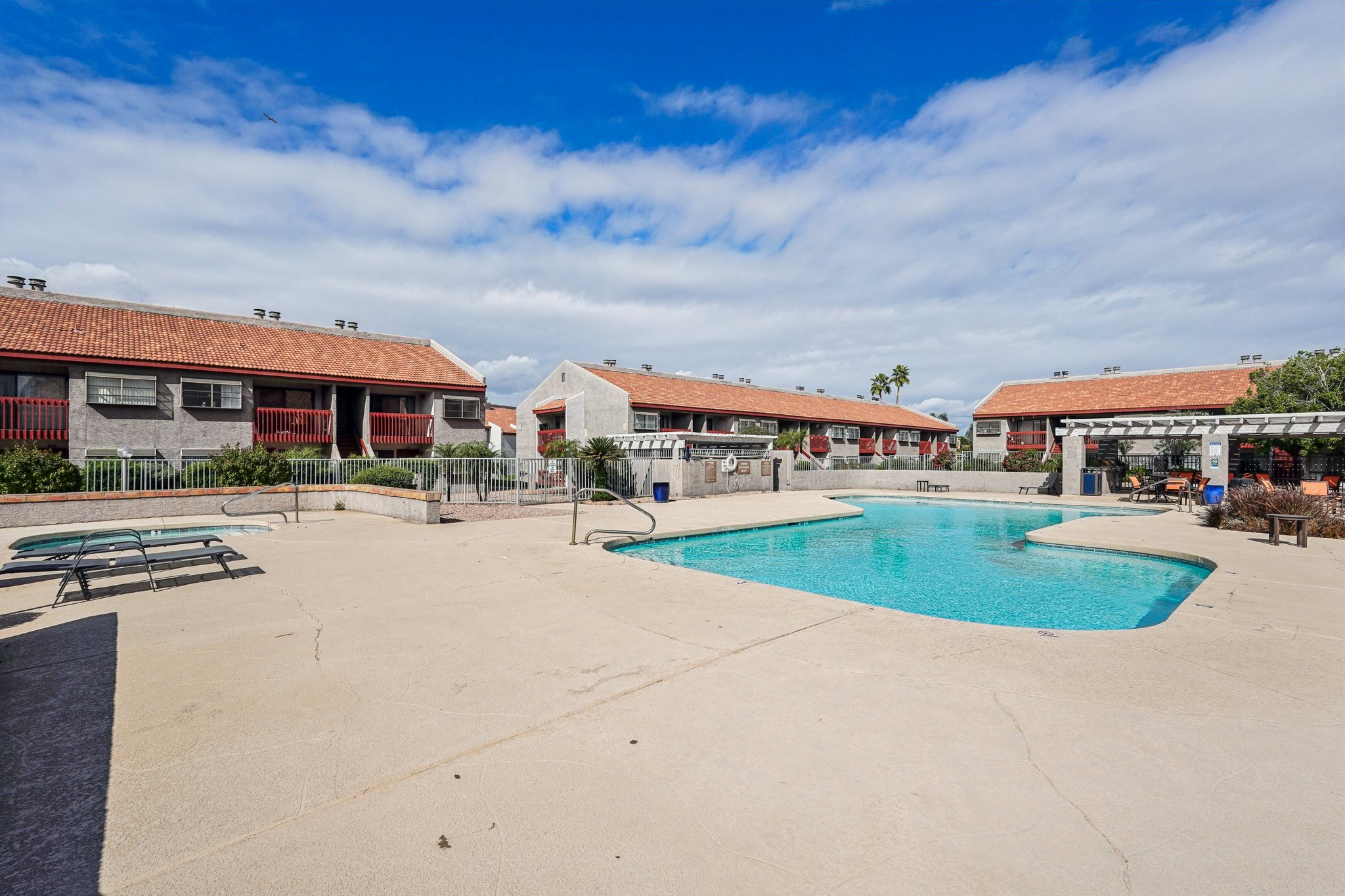 Resort-style swimming pool at Woodstream Village